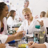 Schoolchildrenandtheirteacherinahighschoolscience_4759103_original