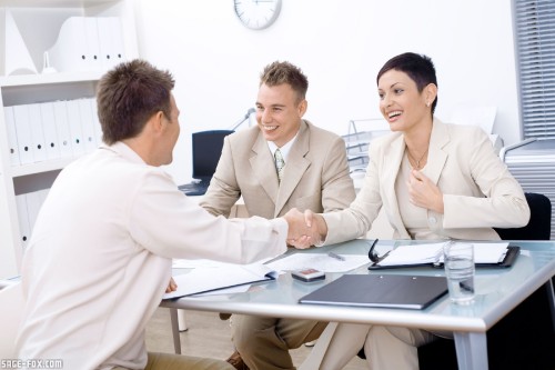 Businesspeople-conducting-job-interview_12208711.jpg